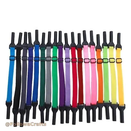 Black neoprene glasses strap attached to sunglasses