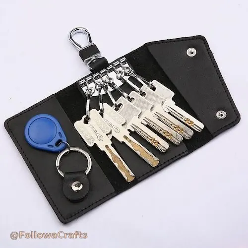 Leather folding key case open with keys