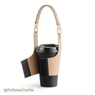 Leather coffee cup sleeve on a takeaway cup