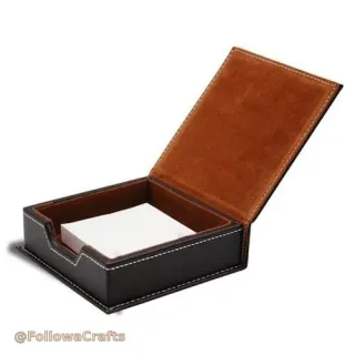 Black leather memo note box with yellow sticky notes
