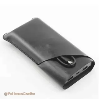 Black leather power bank sleeve with a power bank