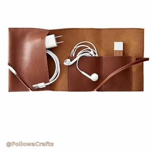 Leather tech cord organizer roll open with cables