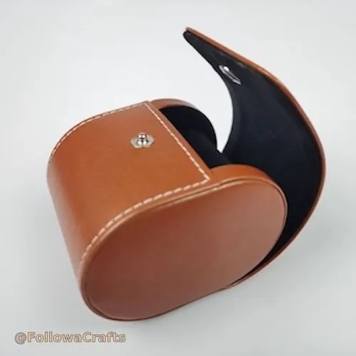 Single slot PU leather watch roll on white background