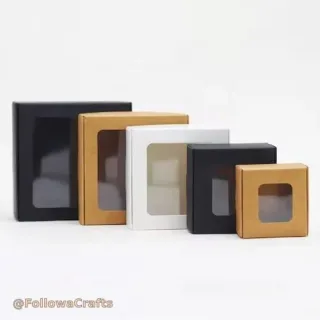 Rigid gift box with clear plastic window showing product