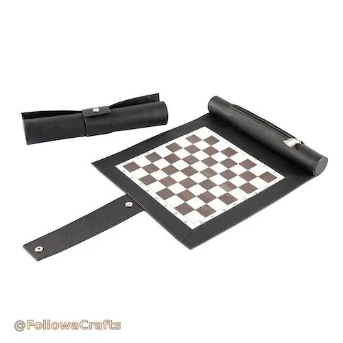 Roll-up leather chess set rolled and open