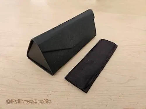 Triangle folding PU leather glasses case flat and open